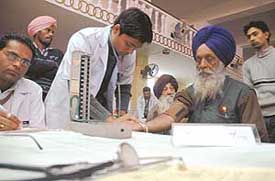 Patients are examined at a camp on healthy living organised by the Nature Cure Education Trust in Ludhiana on Wednesday. 