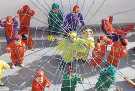 Children of Disneyland perform during a fancy dress show organised at the school in Ludhiana. 