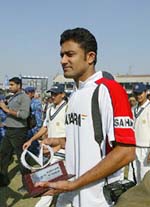 Anil Kumble with the man of the match trophy after the end of the second Test between India and Sri Lanka in New Delhi on Wednesday. 