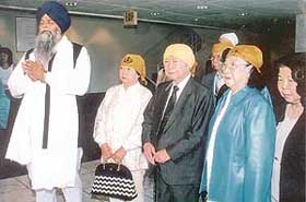 Chinese family at the wedding ceremony in a gurdwara in America