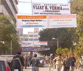 Banners displayed by candidates in fray for the District Bar Association elections in violation of the code of conduct in Ludhiana
