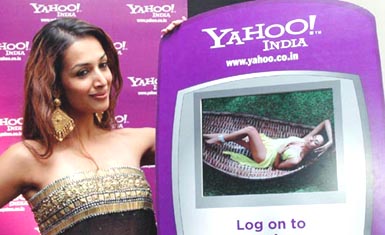 Actress Malaika Arora downloads her style gallery from Yahoo! India mobile service in Mumbai on Friday.