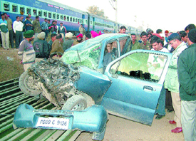 The mangled remains of a car after a Pathankot-bound train rammed into it in Jalandhar on Friday.