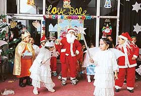 Santa Claus makes merry at the Christmas Day celebrations at Love Dale Montessori in Ludhiana