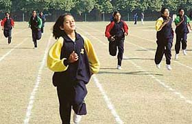 Students of Saupin's School, Sector 32, take part in the 200 metres race during the school's athletic meet at the Sector 46 stadium in Chandigarh