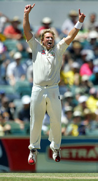 Australias Shane Warne celebrates taking the wicket of AB DeVilliers of South Africa on the second day of the first Test in Perth on Saturday.