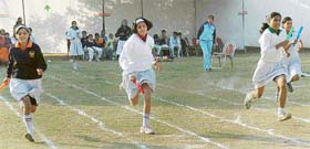 Students of DC Model Senior Secondary School, Sector 7, Panchkula, take part in a relay race during the school's annual sports meet