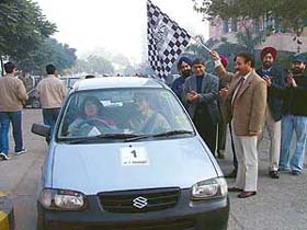 Mr S.K. Sharma, Commissioner, Municipal Corporation, flags off a vehicle at Maruti Suzuki Womens’ Fun Drive in Ludhiana
