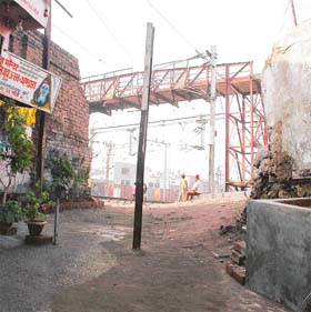 Barricades put up at the old Lakkar bridge site to discourage vehicles carrying illegal parcels for booking at the Ludhiana railway station