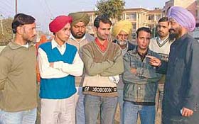 Charanjit Singh, Karnail Singh, Parmod Kumar and Surinder Singh, who were rescued from Malaysia in Ludhiana