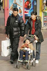 A Chinese family shops in Shanghai on Tuesday