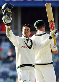 South Africas Jacques Rudolph celebrates reaching his century during the fifth day of the first Test against Australia in Perth on Tuesday
