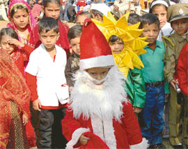 Students of Maharishi Dayanand Public School, Daria village, wait to perform in the annual function on Wednesday.