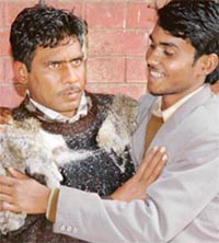 Rashid (right) is all smiles on being united with his father, Jahid, who went missing from Nagina, Uttar Pradesh, two years ago. He was found in a pathetic condition in Nayagaon, before being united with his family by an NGO.