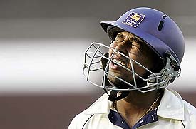 Sri Lankas Tillakaratne Dilshan reacts after his dismissal during the fourth day of the third Test match between India and Sri Lanka in Ahmedabad on Wednesday