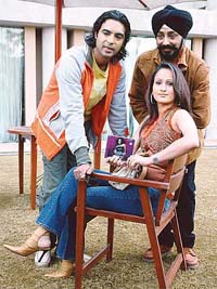 MAKING MUSIC: Composer-singer Micky Narula and actress Vijaya with the non-executive Chairman of Frankfinn Aviation at the Taj Hotel, Chandigarh