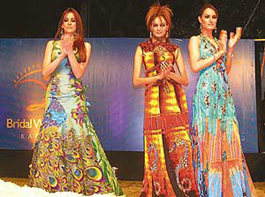 Pakistani models display bridal dresses at a fashion show "Bridal Waves" in Karachi on Wednesday.