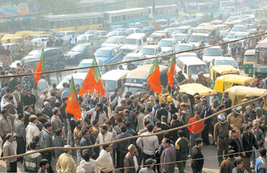 BJP activists protesting against the demolition drive at Vikas Marg in the Capital on Thursday.
