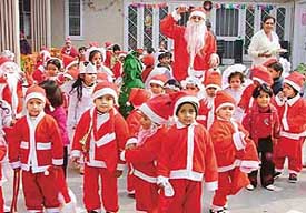 Little Santas bring Christmas flavour to St Xaviers Playway in Ludhiana on Thursday.