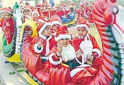Tiny tots in joyful mood during Christmas celebrations at Shemrock Senior Secondary School in Mohali on Friday.