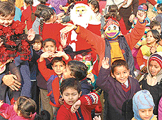 Santa Claus enthralls students of Tender Heart School in Chandigarh on Friday.