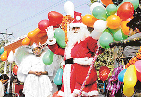 Santa Claus leads the Christmas procession in Chandigarh on Friday.