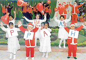 students of Green Land Senior Secondary School dress up as fairies to celebrate Christmas.