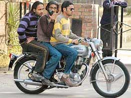 Riders endanger lives by not wearing helmets.