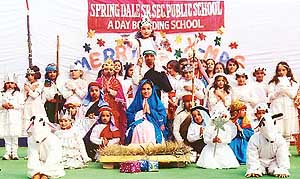 Students of Spring Dale school present a tableau at Christmas celebrations held in the school, on Friday.