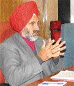 PAU Vice Chancellor K.S. Aulakh addressing a press conference in Ludhiana on Friday. 