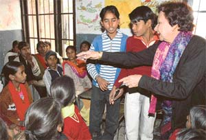 PEARLS OF WISDOM : Ms Rodrigues interacts with the slum kids, inspiring them to work hard and improve their lot