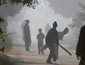Kids enjoy cricket in the fog that engulfed Chandigarh