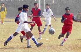 Players of Orissa and Chhattisgarh trying to control the ball in the Under-14 Soccer Festival at PEC, Chandigarh