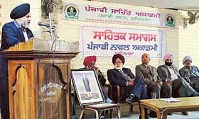 Novelist Davinder Sekha speaks at a seminar organised by the Punjabi Novel Akademy at Punjabi Bhavan in Ludhiana on Monday.