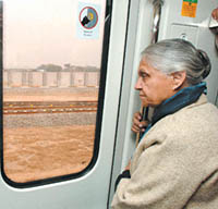 Chief Minister Sheila Dikshit taking a ride on the Metro during the final trial run on line 3, which will be inaugurated by Prime Minister Manmohan Singh on December 30.