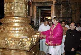 Super star Amitabh Bachchan is accompanied by Samajwadi Party leader Amar Singh as they take part in a ceremony at Lord Venkateswara Temple in Tirupati on Tuesday