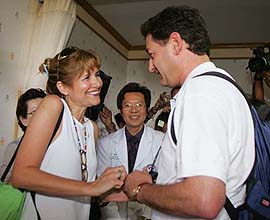 Israeli volunteer doctor Dorit Nitzan and Ron Bombiger, an Israeli survivor of the tsunami, exchange engagement rings on the Thai island of Phuket