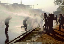 Agitating unemployed elementary teachers being dispersed at Matka Chowk, Sector 17, Chandigarh, on Wednesday