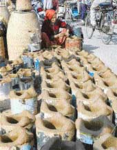 Although angithis (ovens) are no longer being used for cooking, people have started buying these for heating up their rooms due to severe cold.