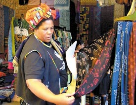 A South African national visiting Afrikhadi Exibit, an exhibition of products by artisans of India and South Africa, at Dilli Haat in the Capital on Thursday