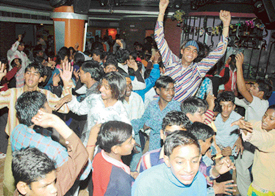  City slum kids enjoy the New Year bash at Aerizzona.