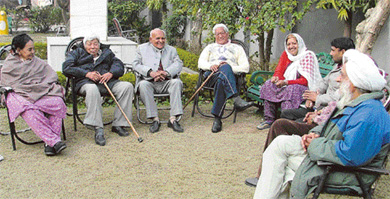 The inmates of Senior Citizens Home here enjoy sitting in the sun in Ludhiana on Friday