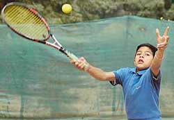 Akshat Joshi, who won the under-14 and under-16 titles at the Fort Ramgarh YMCA Total Tennis Championship in Chandigarh on Saturday. 