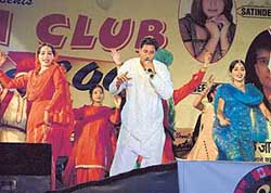 Harbhajan Mann entertains the crowd at a New Year function in Ludhiana on Sunday. 