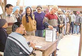 Railway employees cast their ballots in Ludhiana