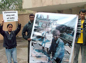Greenpeace activists protest outside the French Embassy in New Delhi on Tuesday against the French Governments decision to send the aircraft carrier Clemenceau for dismantling at the Alang shipyard in India.