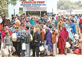Long queues of consumers outside a kerosene depot in Chandigarh