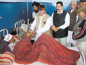 Faridabads senior Deputy Mayor Shiv Charan Lal Sharma distributing fruits to patients at a government hospital in Faridabad to celebrate the birthday of Deependra Hooda, MP