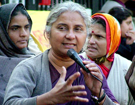 Medha Patekar, leader of the Narmada Bachao Andolan, addresses people during a dharna in support of the migrants of Sardar Sarovar Dam at Shastri Bhavan in New Delhi on Wednesday.
