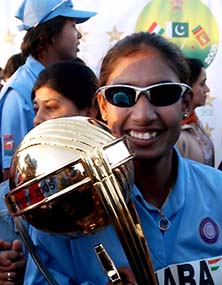 Indian women's cricket team skipper Mithali Raj holds the trophy after beating Sri Lanka in the final of the Asia Cup in Karachi on Wednesday